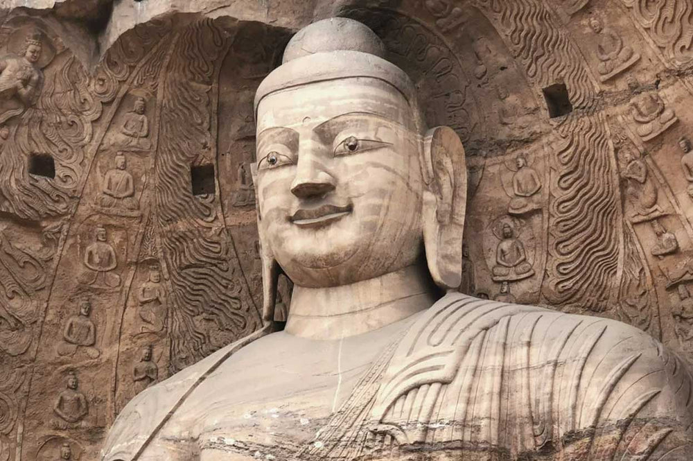 Yungang Grottoes Tryadhva-buddha Statue: A Historical Marvel