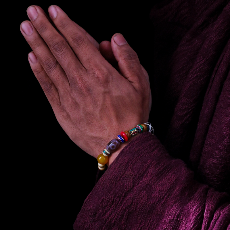 The Tibetan King's Spiritual Practice Three-Eyed Dzi Bead Bracelet & The Eye of the Summit Tibetan Red Cracked Pattern Dzi Bead puretibetan